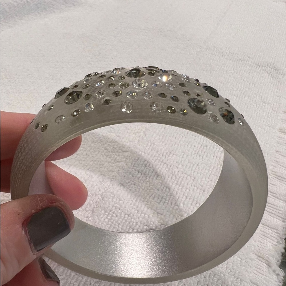 Smoked plastic slip on bracelet cuff with clear and grey rhinestone detail